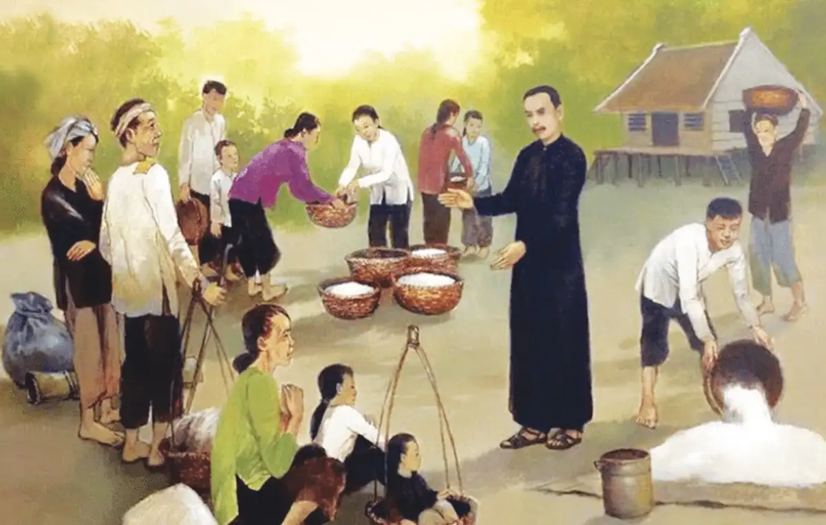 Cha Phanxicô Xaviê Trương Bửu Diệp phát gạo cho bà con lương giáo