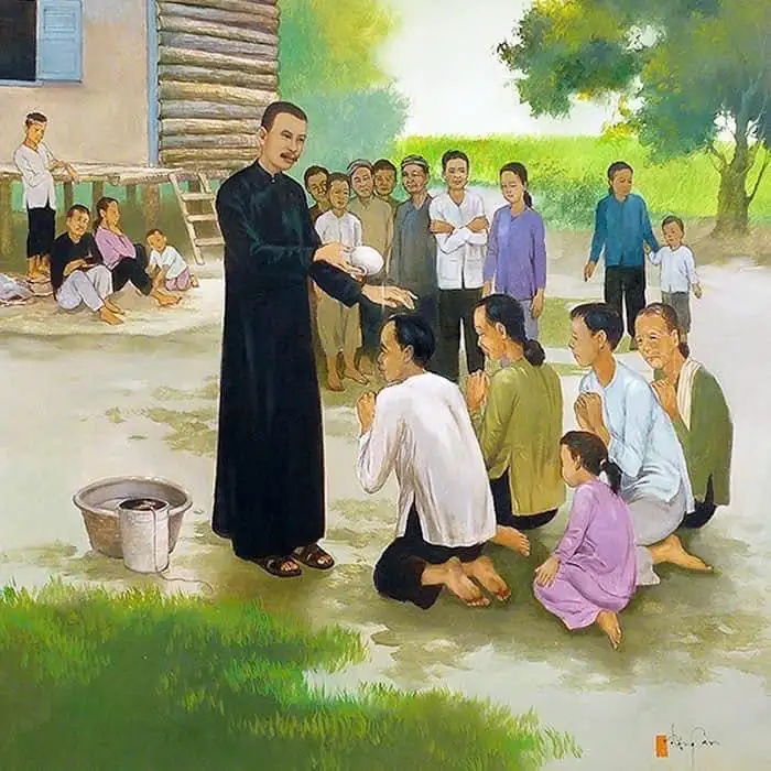 Cha Phanxicô Xaviê Trương Bửu Diệp rửa tội cho bà con dự tòng